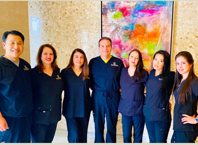 Dr. Anthony Farole with the Facial Cosmetic Surgery Center team